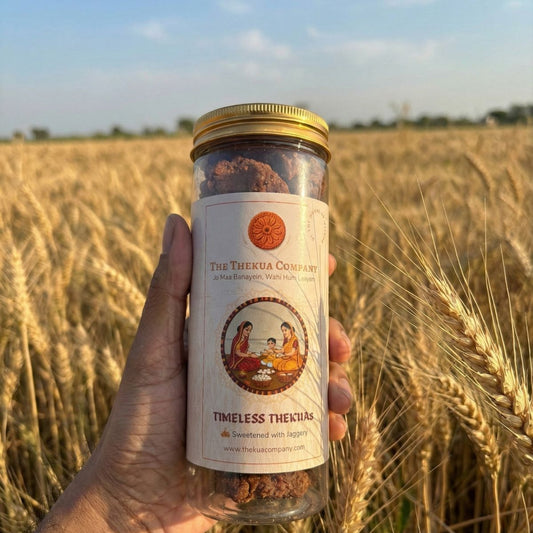 thekua 250gm pack in front of wheat field